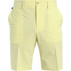 J.LINDEBERG ELOY TAPERED MICRO Krótkie spodenki sportowe still yellow. Żółte spodenki sportowe męskie marki J.LINDEBERG, z elastanu, sportowe. Za 419,00 zł.