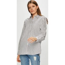 Tommy Jeans - Koszula. Białe koszule jeansowe damskie marki Tommy Jeans, s, w paski, klasyczne, z klasycznym kołnierzykiem, z długim rękawem. W wyprzedaży za 219,90 zł.