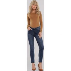 Niebieskie Jeansy Dundas. Niebieskie jeansy damskie other, s, z obniżonym stanem. Za 89,99 zł.
