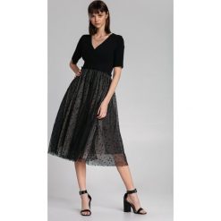 Czarna Sukienka Zainab. Czarne sukienki damskie Renee, s, w grochy, z dzianiny, wizytowe, bez kołnierzyka, bez rękawów, mini, rozkloszowane. Za 139,99 zł.