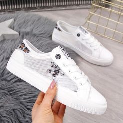 Trampki niskie damskie z siatką białe Big Star FF274487 - biały. Białe trampki i tenisówki damskie BIG STAR, bez wzorów, bez zapięcia. Za 119,99 zł.