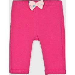 Blukids - Spodnie dziecięce 56-74 cm. Różowe spodnie dziewczęce Blukids, bez wzorów, z elastanu, casualowe. W wyprzedaży za 29,90 zł.