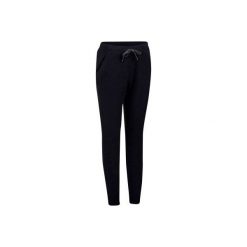 Spodnie slim Gym & Pilates 500 damskie. Czarne spodnie damskie DOMYOS, xs, bez wzorów, z elastanu. W wyprzedaży za 49,99 zł.