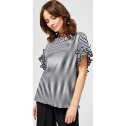 Bluzka bawełniana z aplikacją. Bluzki damskie Moodo, s, z aplikacjami, z bawełny, bez kołnierzyka, bez rękawów. Za 19,99 zł.