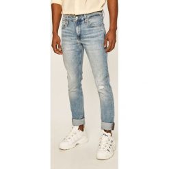 Calvin Klein Jeans - Jeansy Ckj 026. Niebieskie jeansy męskie Calvin Klein Jeans, bez wzorów. W wyprzedaży za 429,90 zł.