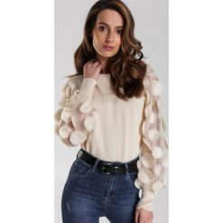 Jasnobeżowy Sweter Hensley. Brązowe swetry damskie Renee, s, bez wzorów, z dzianiny, eleganckie, bez rękawów, bez kaptura. Za 119,99 zł.