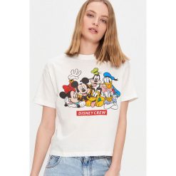 Koszulka z nadrukiem Disney - Kremowy. Białe koszulki damskie House, s, z nadrukiem, bez kołnierzyka, bez rękawów. Za 49,99 zł.