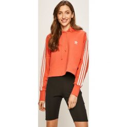 Adidas Originals - Bluza. Czerwone bluzy damskie adidas Originals, z aplikacjami, z bawełny, bez rękawów, z kapturem. W wyprzedaży za 169,90 zł.