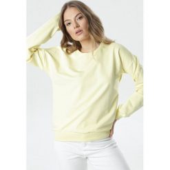 Żółta Bluza Rachael. Żółte bluzy damskie Born2be, xl, bez wzorów, z dzianiny, z długim rękawem, długie, bez kaptura. Za 69,99 zł.
