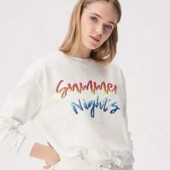 Bluza z kolorowym nadrukiem - Kremowy. Białe bluzy damskie Sinsay, s, z nadrukiem, bez rękawów, bez kaptura. Za 39,99 zł.