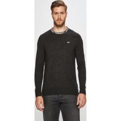 Tommy Jeans - Sweter. Niebieskie swetry męskie Tommy Jeans, s, bez wzorów, z bawełny, z okrągłym kołnierzem, bez kaptura. W wyprzedaży za 299,90 zł.