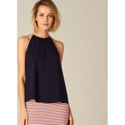 Top z dekoltem halter - Niebieski. Niebieskie topy damskie Mohito, s, bez wzorów, bez kołnierzyka. W wyprzedaży za 19,99 zł.