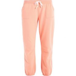 Bryczesy damskie: Juvia PLAIN JOGGER Spodnie treningowe neon peach