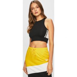 Reebok - Top. Czarne topy damskie Reebok, s, bez wzorów, z elastanu, z okrągłym kołnierzem. W wyprzedaży za 79,90 zł.