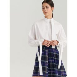Biała koszula oversize ReDesign - Kremowy. Białe koszule damskie marki Reserved, l, z dzianiny. Za 199,99 zł.