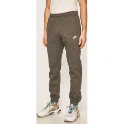 Nike Sportswear - Spodnie. Szare spodnie męskie Nike Sportswear, na co dzień, s, bez wzorów, z bawełny, casualowe. W wyprzedaży za 139,90 zł.