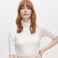 Sweter z golfem -. Swetry damskie Reserved, s, bez wzorów, bez rękawów, bez kaptura. Za 59,99 zł.