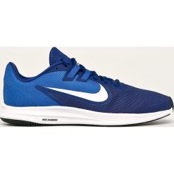 Nike - Buty Downshifter 9. Czerwone sneakersy męskie Nike, z okrągłym noskiem, na sznurówki. Za 259,90 zł.