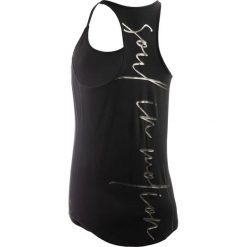 Top do tańca nowoczesnego damski. Pomarańczowe topy damskie DOMYOS, bez wzorów, z elastanu, bez kołnierzyka. Za 59,99 zł.