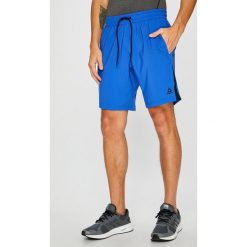 Reebok - Szorty. Niebieskie spodenki sportowe męskie Reebok, s, bez wzorów, z poliesteru, sportowe. W wyprzedaży za 99,90 zł.