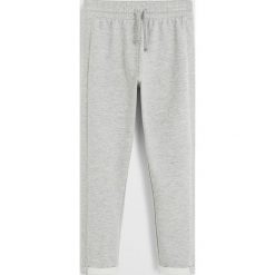 Mango Kids - Spodnie dziecięce Praga 110-140 cm. Szare spodnie dziewczęce Mango Kids, bez wzorów, z bawełny, casualowe. Za 45,90 zł.