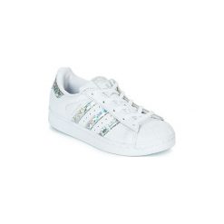 Buty Dziecko adidas SUPERSTAR C. Białe trampki dziewczęce Adidas, bez wzorów, bez zapięcia. Za 269,00 zł.