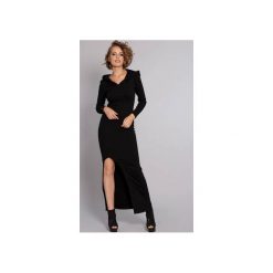 Sukienka Sexy Beast - czarna. Czarne sukienki dzianinowe marki Madnezz, m, z aplikacjami, z kapturem, dopasowane. Za 249,00 zł.