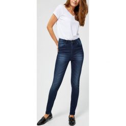 Jeansy typu push up. Niebieskie jeansy damskie Moodo, s. Za 29,99 zł.