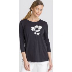 BLUZKA DERRIS Weekend Max Mara. Czarne bluzki damskie Weekend Max Mara, s, z aplikacjami, z elastanu, z okrągłym kołnierzem, bez rękawów. Za 269,40 zł.