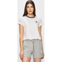 Hummel - Top sportowy. Białe topy damskie Hummel, s, bez wzorów, z elastanu, z okrągłym kołnierzem. W wyprzedaży za 69,90 zł.