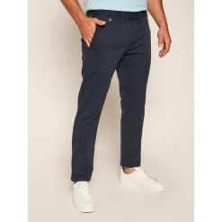 Spodnie materiałowe Tommy Jeans Tjm Original DM0DM04398. Niebieskie jeansy męskie Tommy Jeans, m, bez wzorów, z jeansu. Za 399,00 zł.