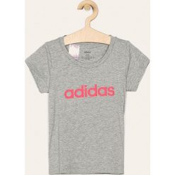 Adidas - T-shirt dziecięcy 128-170 cm. Szare bluzki dziewczęce Adidas, z nadrukiem, z bawełny, z okrągłym kołnierzem, z krótkim rękawem, krótkie, bez kaptura. W wyprzedaży za 49,90 zł.
