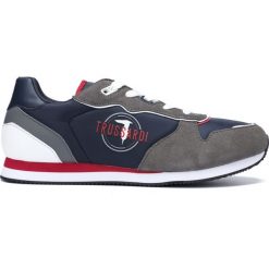 Trussardi Jeans Tenisówki Niebieski. Niebieskie trampki męskie Trussardi Jeans, bez wzorów, z jeansu, bez zapięcia. Za 585,95 zł.