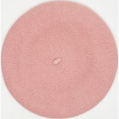 Wełniany beret - Różowy. Różowe berety damskie Sinsay, bez wzorów, z wełny. Za 25,99 zł.
