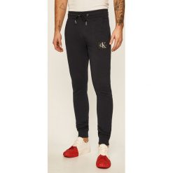 Calvin Klein Jeans - Spodnie. Szare spodnie męskie Calvin Klein Jeans, s, bez wzorów, z elastanu. W wyprzedaży za 319,90 zł.