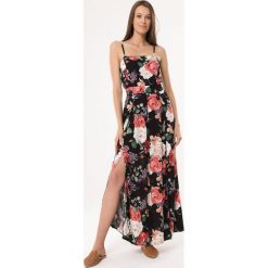 Czarna Sukienka Drop In. Czarne sukienki damskie Born2be, s, bez wzorów, bez kołnierzyka, bez rękawów. W wyprzedaży za 74,99 zł.