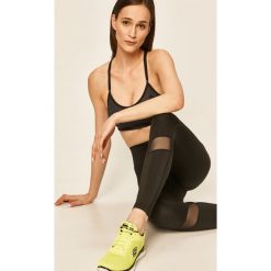 Craft - Legginsy sportowe. Czarne spodnie damskie Craft, s, bez wzorów, z elastanu, z podwyższonym stanem. Za 269,90 zł.