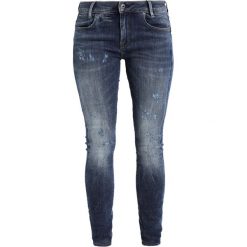 GStar DSTAQ 5PKT MID SKINNY Jeans Skinny Fit trender ultimate stretch denim. Szare rurki damskie G-Star, z elastanu. W wyprzedaży za 391,30 zł.