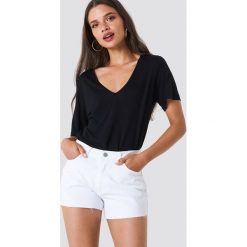 Trendyol Szorty jeansowe z surowym wykończeniem - White. Białe szorty jeansowe damskie marki Trendyol. W wyprzedaży za 56,67 zł.