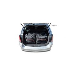 OPEL ASTRA TOURER, 2004-2013 TORBY DO BAGAŻNIKA 5 SZT KJUST - 7031108. Torby podróżne KJUST, bez wzorów, z kauczuku, klasyczne. Za 1319,00 zł.