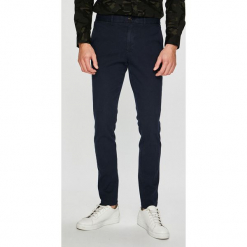 Tommy Hilfiger - Spodnie. Szare chinosy męskie TOMMY HILFIGER, z bawełny. Za 549,90 zł.