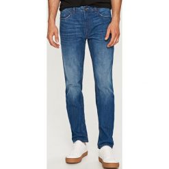 Jeansy regular fit - Niebieski. Niebieskie jeansy męskie regular Reserved. Za 99,99 zł.