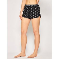 Szorty piżamowe Calvin Klein Underwear Lounge 000QS6437E. Czarne piżamy damskie Calvin Klein Underwear, l, bez wzorów, z bawełny, bez rękawów. Za 139,00 zł.