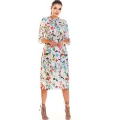 Sukienka midi w kwiaty z gumką w pasie ecru - m. Sukienki damskie e-margeritka.pl, s, w kwiaty, z poliesteru, eleganckie, ze stójką, z długim rękawem, długie, midi, rozkloszowane. Za 139,99 zł.