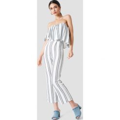 Flynn Skye Kombinezon Claire - White,Blue. Białe kombinezony z printem Flynn Skye, z tkaniny. W wyprzedaży za 230,99 zł.