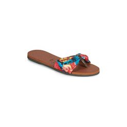 Japonki Havaianas YOU ST TROPEZ. Pomarańczowe klapki damskie Havaianas, bez wzorów, bez obcasa. W wyprzedaży za 116,10 zł.