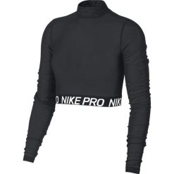 Nike Koszulka Czarny. Czarne koszulki damskie Nike, l, bez wzorów, z elastanu, bez kołnierzyka, z długim rękawem. Za 223,95 zł.