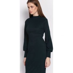 Zielona Sukienka Loyality. Zielone sukienki balowe marki Born2be, na imprezę, l, z dzianiny, z okrągłym kołnierzem, z długim rękawem, midi. Za 79,99 zł.