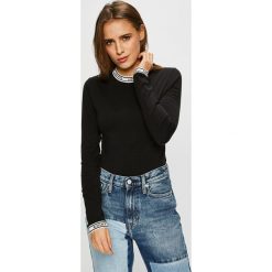 Levi's - Bluzka. Czarne bluzki damskie Levi's®, s, bez wzorów, z elastanu, casualowe, z okrągłym kołnierzem. W wyprzedaży za 119,90 zł.