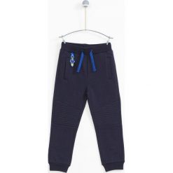 Lemon Explore - Spodnie dziecięce 86-116 cm. Szare spodnie chłopięce marki LEMON explore, bez wzorów, z bawełny, sportowe. W wyprzedaży za 49,90 zł.